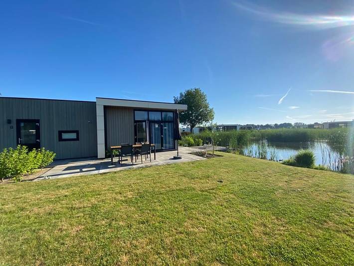 Vakantiehuis voor 4 personen, with uitzicht op het meer and tuin as well as sauna and zwembad in het Nationaal Park Veluwezoom