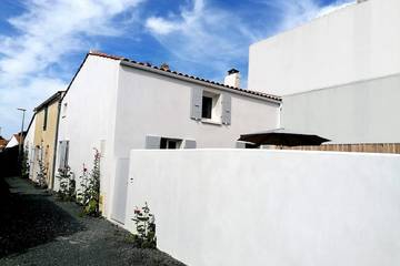 Location de vacances pour 4 personnes, avec jardin à Le Grand-Village-Plage