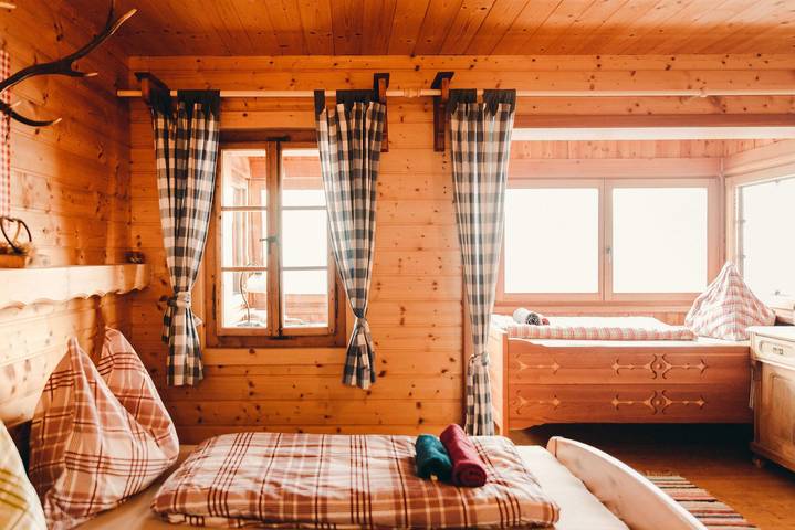 Ganze Ferienwohnung, Almrauschsuite - 5-Bett Familienzimmer mit Veranda in Millstatt, Bezirk Spittal an der Drau