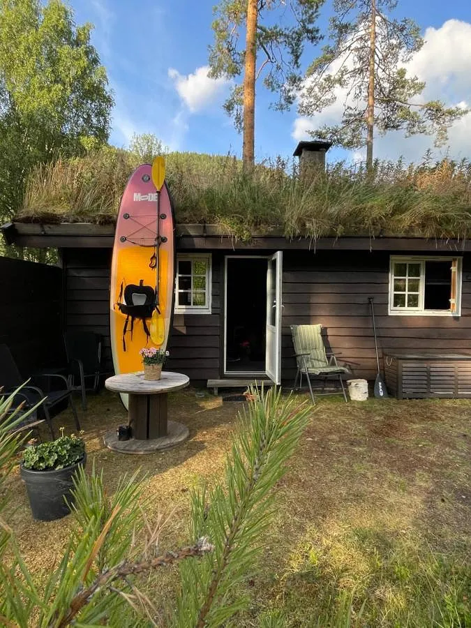 Ferienhaus für 3 Personen, mit Terrasse und Garten sowie Seeblick - 1