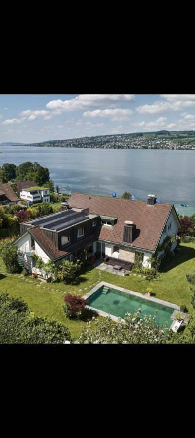Mansion at the lake, Pool, Sauna and Boat in Käpfnach, Horgen