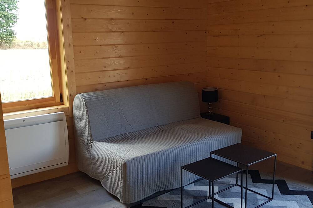 Chaleureux chalet en bois tout équipé in Calorguen, Région de Dinan