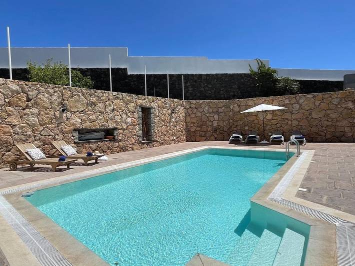 Ferienwohnung für 5 Personen, mit Terrasse und Garten sowie Pool und Ausblick in Conil (Lanzarote)
