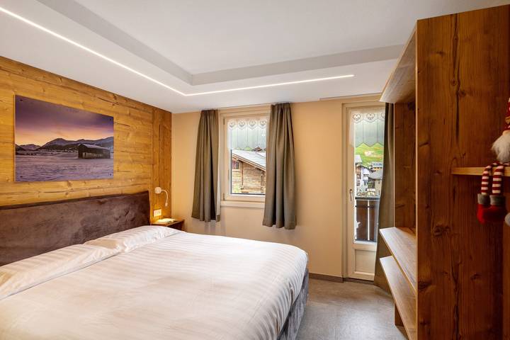 Apartamento entero, Apartamento 'A Due Passi Verde' con vistas a la montaña, balcón y Wi-Fi in Livigno (Town), Livigno