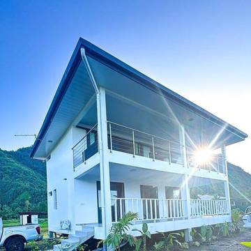 Cottage pour 7 personnes, avec vue ainsi que balcon et jardin dans Teahupo'o