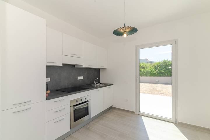 Appartement entier, Appartement « Bleu avec Patio » avec terrasse privée à 3 min à pied de la plage de Budoni in Budoni, Olbia-Tempio
