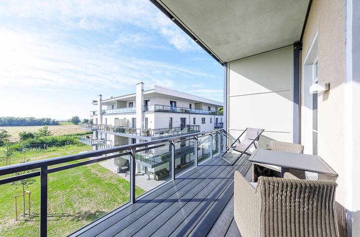 Ferienwohnung für 2 Personen, mit Balkon und Seeblick in Wustrow