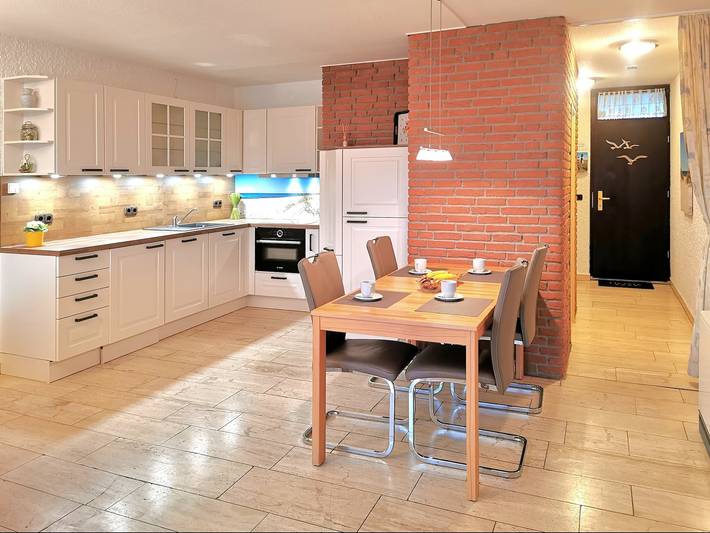 Ferienwohnung für 7 Personen, mit Balkon und Garten in Tossens