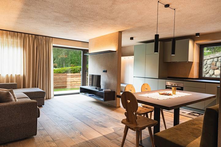 Appartamento per 6 persone, con Giardino e Sauna nonché Vista lago in Alto Adige