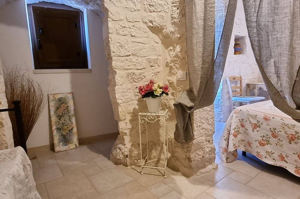 Trulli Bianchi. Characteristic stone trullo with private pool and panoramic view in Alberobello Region, Bari Province
