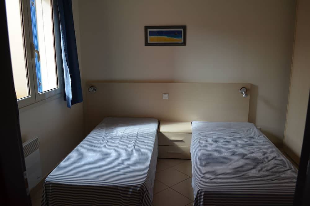 Apartamento entero, Apartamento para 6 personas en una residencia cerca del mar en Lozari in Losari, Belgodère