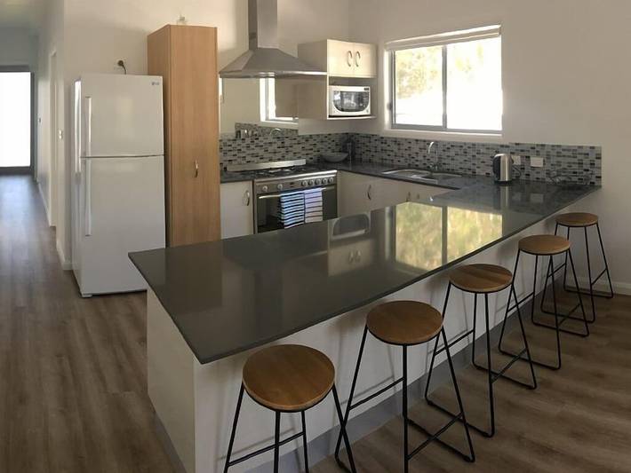 Holiday home for 6 people, with garden and balcony in Hat Head