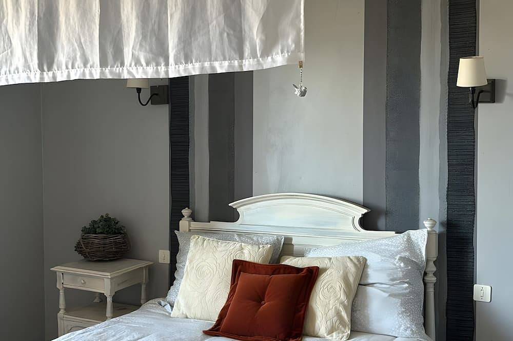Chambre d’hôtes « La Chambre Marcelle “La Parenthèse” » avec vue montagne, jardin partagé et Wi-Fi in Folles, Région de Bellac