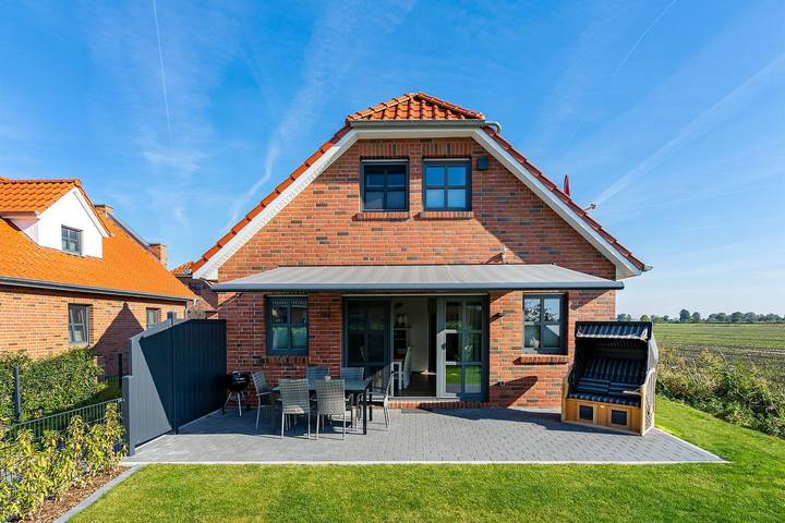 Ferienhaus für 6 Personen, mit Terrasse und Garten in Krummhörn