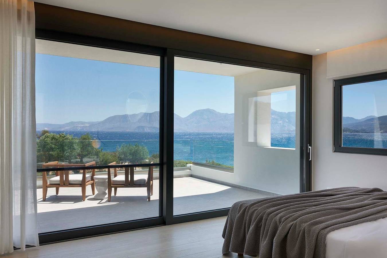 Wonderful  Crete Villa | Seafront Villa Seraphis | 6 Bedrooms | Private Heated Pool | Fitness Area & Cinema Room | Outdoor Dining Area & Bbq | Direct Access to Rocky Beach | Agios Nikolaos in Almyros Beach (Agios Nikolaos), Lasithi