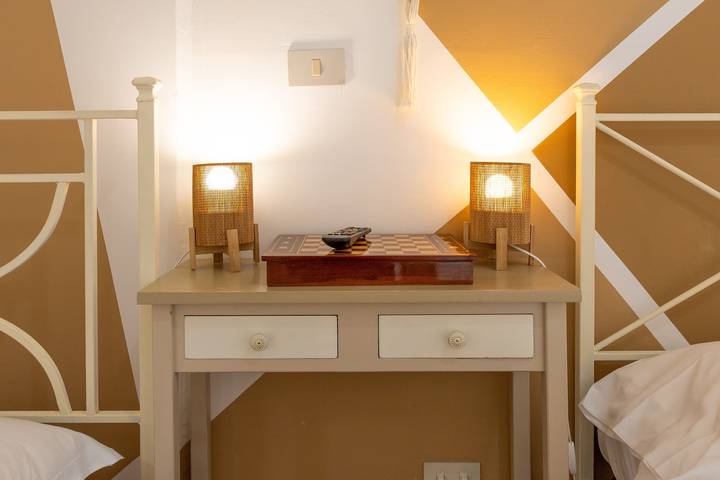 Room 'Piccolo Paradiso - Camera 5' with Shared Terrace, Shared Garden and Wi-Fi in Livorno, Etruscan Coast