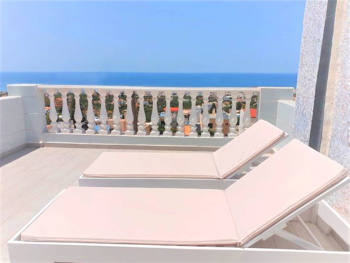 Vakantieappartement voor 2 personen, with uitzicht and uitzicht op zee as well as tuin in Koutouloufari
