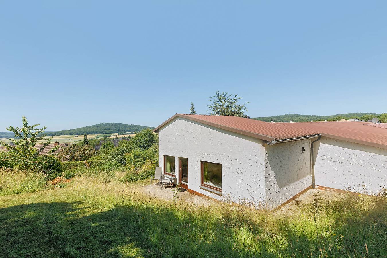 Bungalow 'Die Grüne Wiese' mit Gemeinschaftsterrasse, Gemeinschaftsgarten und Wi-Fi in Niedenstein, Schwalm-Eder-Kreis