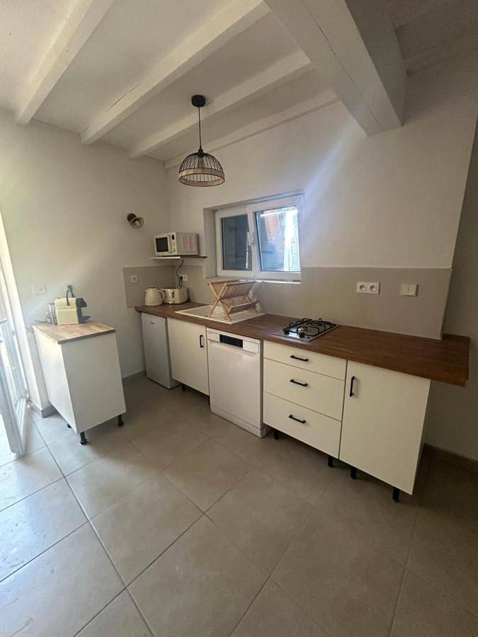 Appartement de vacances pour 4 personnes, avec jardin ainsi que vue et piscine