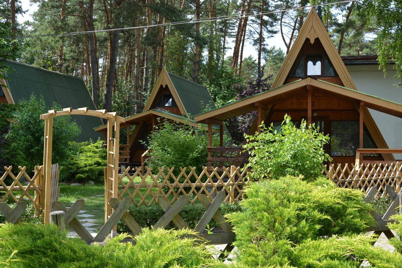Ośrodek Wypoczynkowy Puszczyk Wolnostojące Domki Sosnowe z zadaszonym tarasem in Sieraków, Wielkopolska