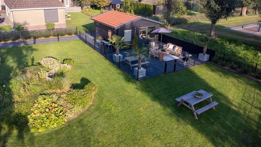 Vakantiewoning voor 4 personen, with uitzicht and tuin as well as uitzicht op het meer in Eernewoude