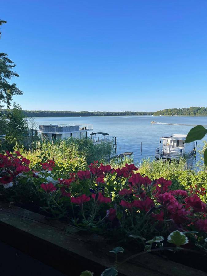 Ferienwohnung für 5 Personen, mit Balkon und Garten sowie Seeblick und Ausblick