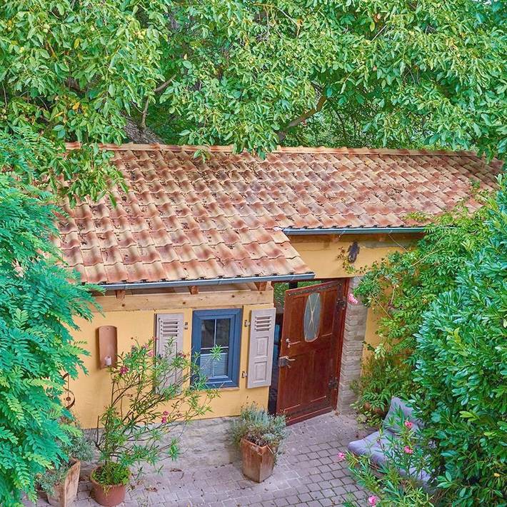 Ferienwohnung für 3 Personen, mit Terrasse und Garten sowie Ausblick in Flonheim