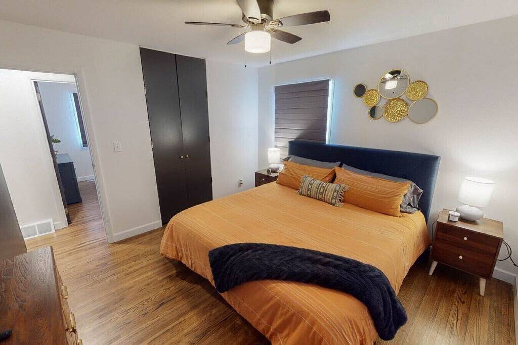 Stylish Mid-Century Home | 4Br | 2 King Beds | Sleeps 10 | Big Backyard in Wichita, Kansas