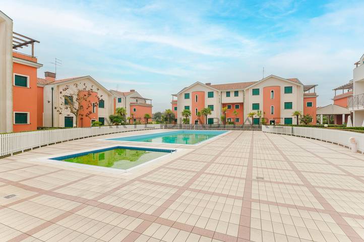 Ferienwohnung für 5 Personen, mit Ausblick und Balkon sowie Pool in Cavallino