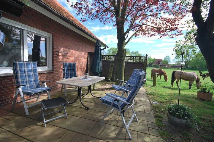 Ferienhaus für 4 Personen, mit Terrasse und Garten, mit Haustier in Uplengen