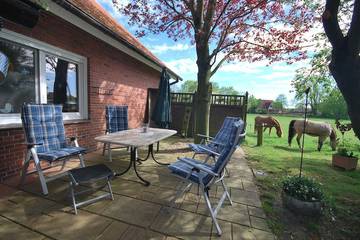 Ferienhaus für 4 Personen, mit Terrasse und Garten, mit Haustier in Uplengen