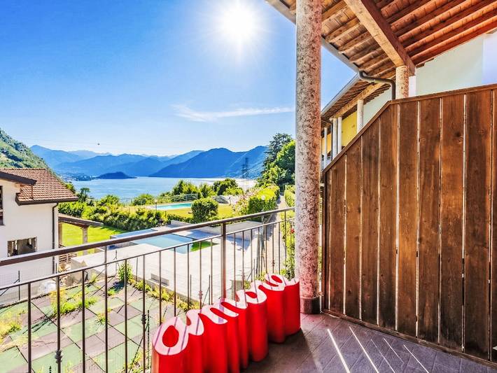 Ferienwohnung für 4 Personen, mit Garten und Balkon sowie Seeblick