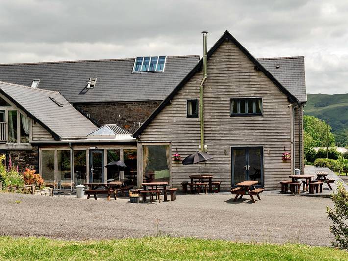 Holiday rental for 38 people, with hot tub and garden as well as balcony, child-friendly in Ceredigion