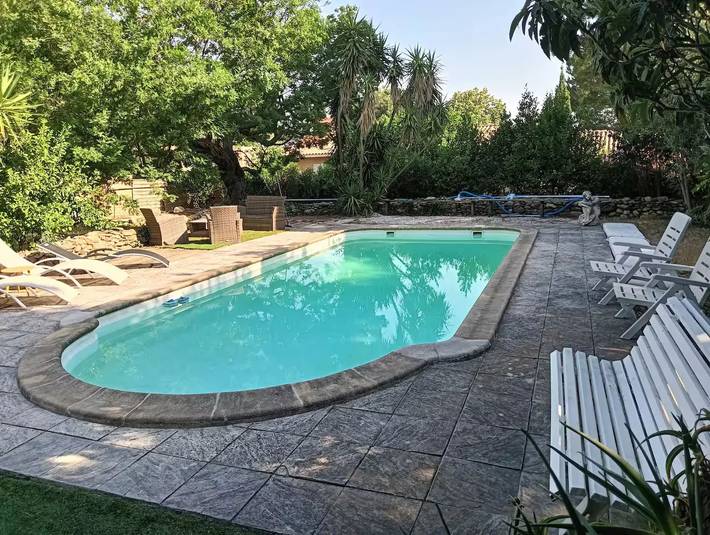 Appartement de vacances pour 4 personnes, avec Terrasse ainsi que Jardin et Piscine