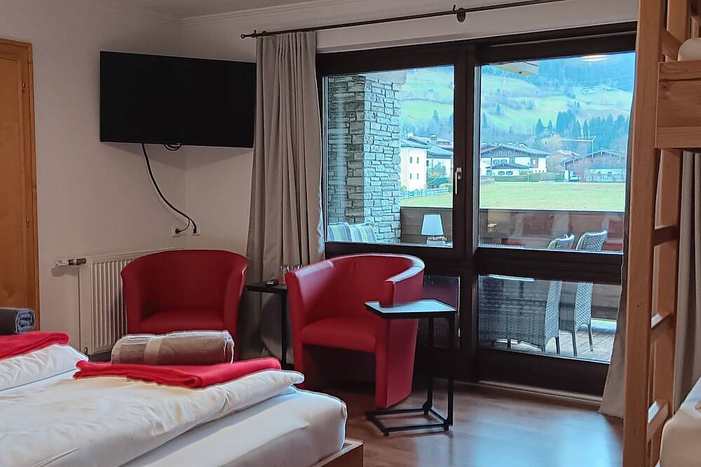 Gästehaus Huberfour-bed room with balcony in Mittersill, Kitzbüheler Alpen