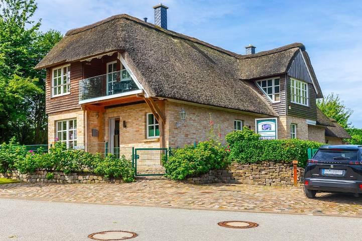 Ferienhaus für 4 Personen, mit Balkon und Garten