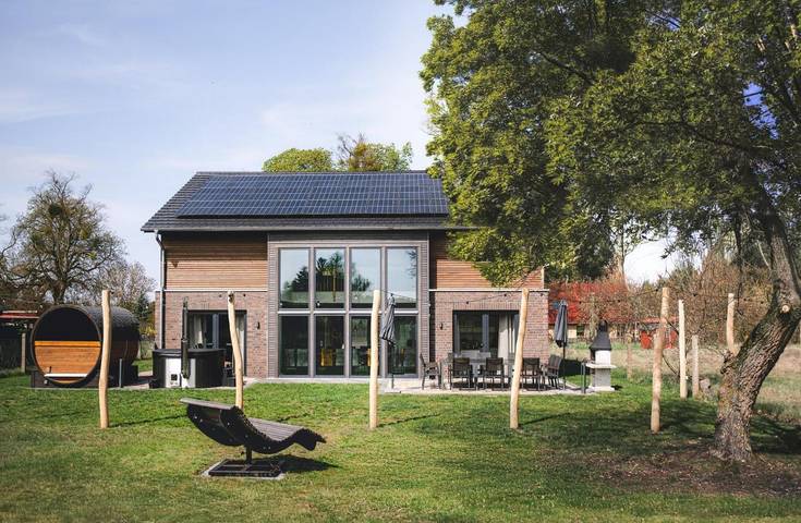 Ferienwohnung für 20 Personen, mit Terrasse und Garten sowie Sauna und Ausblick