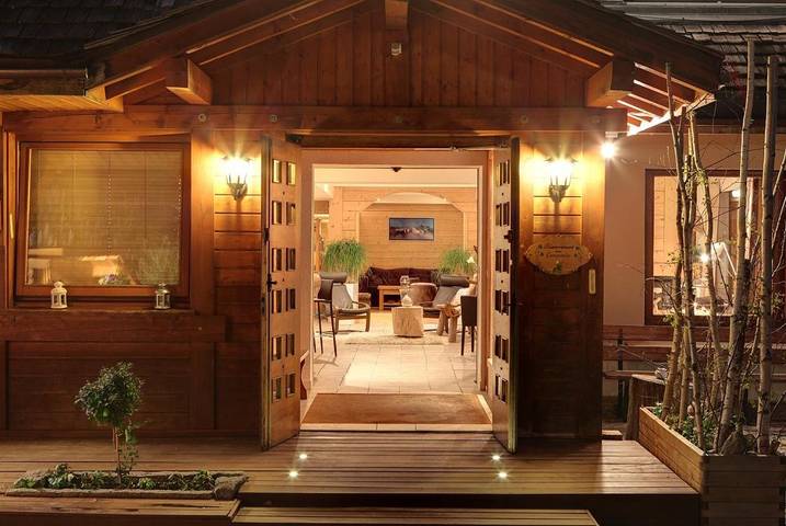 Hôtel pour 4 personnes, avec Terrasse ainsi que Jardin et Sauna