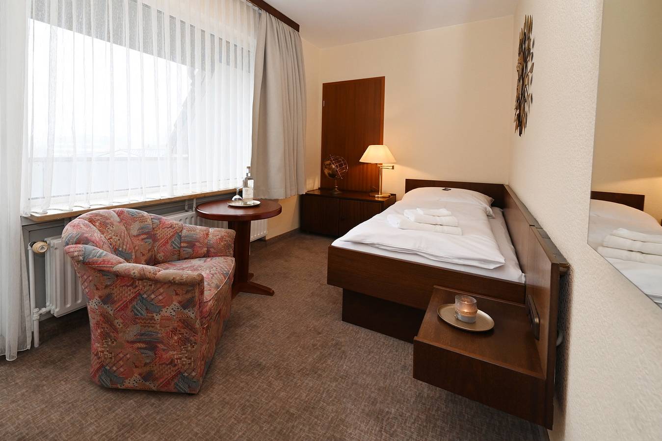 Strandhotel Salty - Einzelzimmer mit Balkon in Hafen Büsum, Büsum