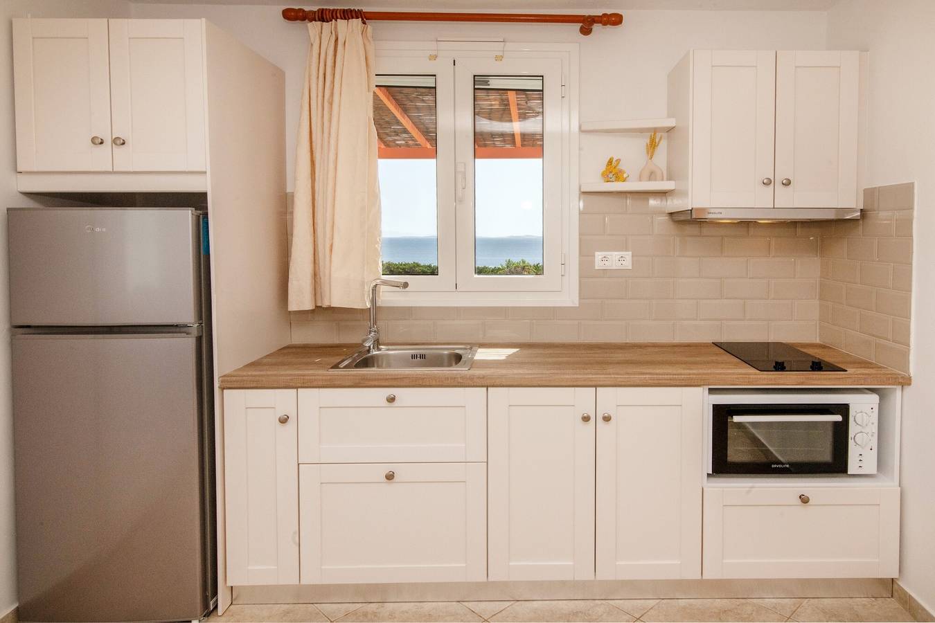 Ferienhaus 'Anemologio 201 Tinos' mit Meerblick, Wlan und Klimaanlage in Ormos Agiou Ioannou, Tínos