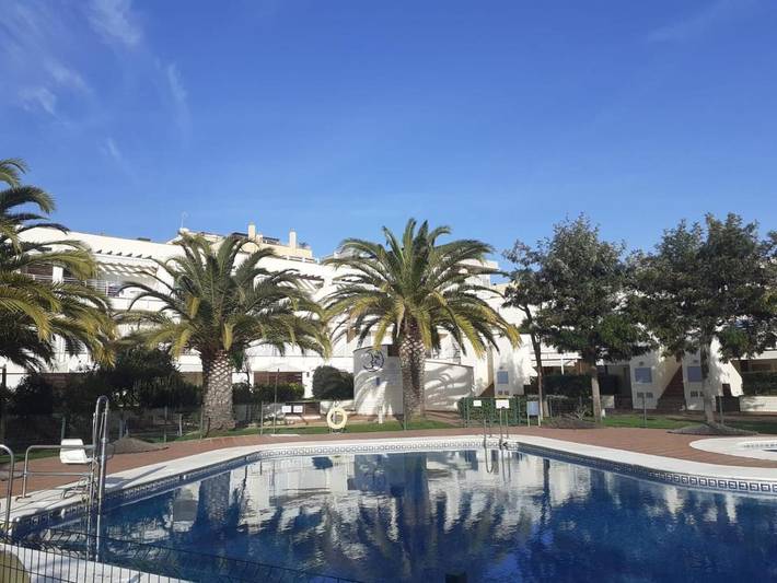 Apartamento de férias para 4 pessoas, com terraço e vista e ainda piscina, com animais de estimação em Isla Cristina