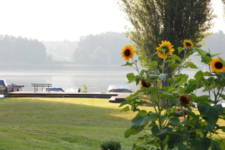Ferienwohnung für 3 Personen, mit Terrasse und Garten sowie Seeblick und Ausblick
