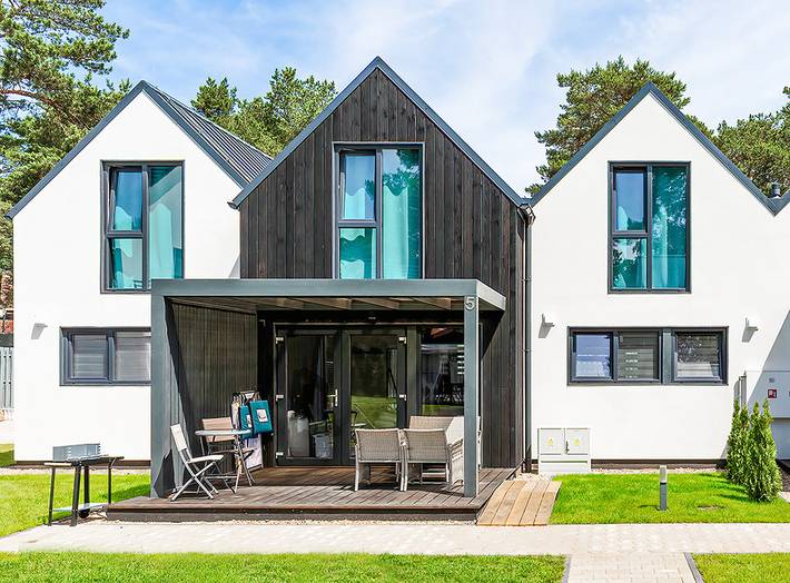 Maison de vacances pour 7 personnes, avec Jacuzzi et Terrasse ainsi que Jardin et Sauna en Pologne