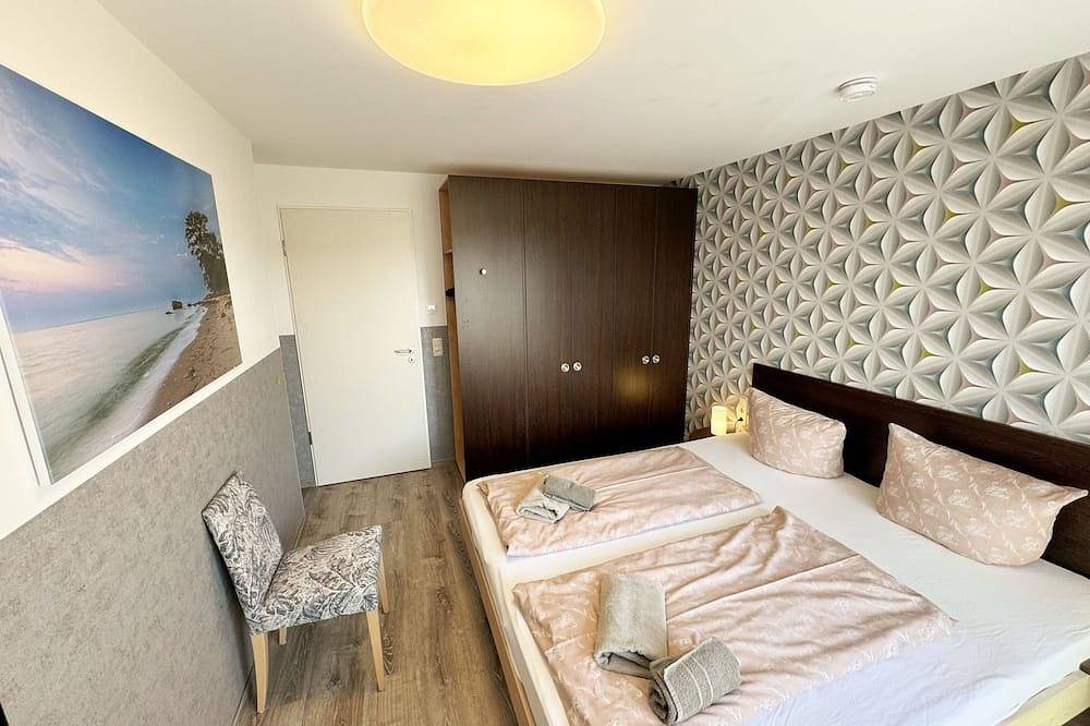 Ganze Wohnung, Wohnung 02 mit Terrasse und Boddenblick - Mr: Haus Inselperle mit Blick auf den in Alt Reddevitz, Mönchgut
