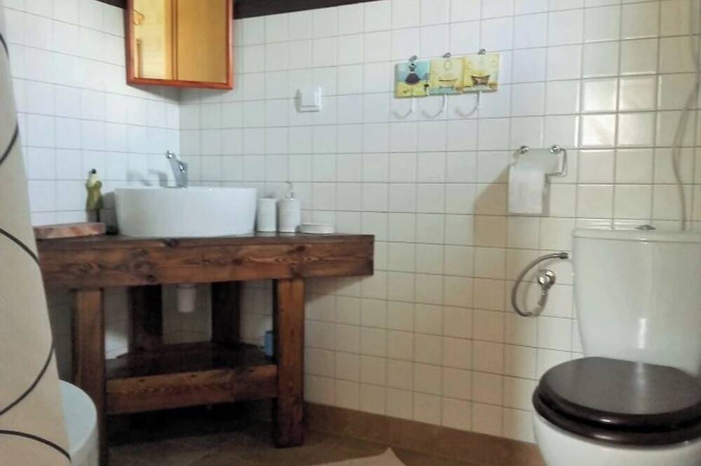 Sommerhaus aus Holzbalken in Mauersee