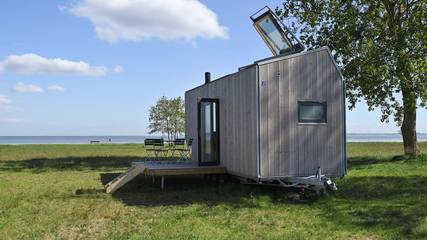 Ferienhaus mit Meerblick für 4 Personen, mit Sauna und Terrasse sowie Ausblick in Schillig