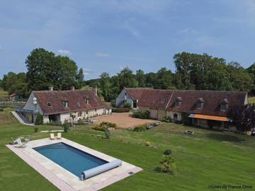 Gîte pour 11 personnes, avec piscine et jardin ainsi que terrasse et jacuzzi dans Orne