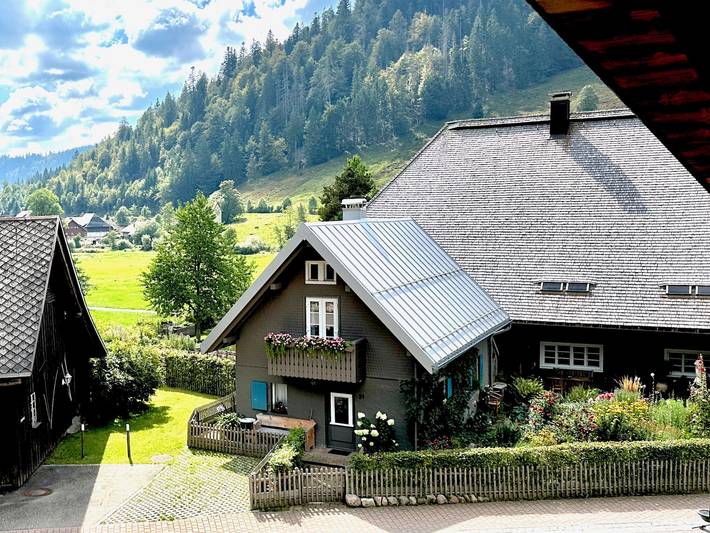 Ferienhaus für 4 Personen, mit Balkon und Garten