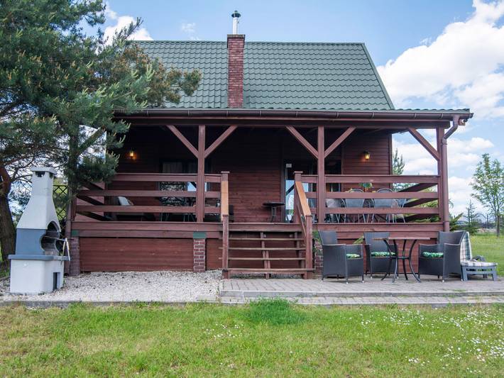 Ferienhaus für 6 Personen, mit Terrasse und Garten sowie Seeblick und Ausblick