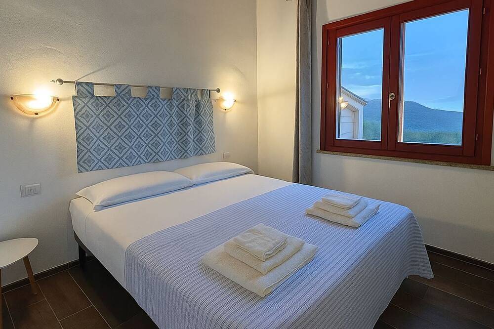 Cozy apartment surrounded by nature, with terrace and veranda in Palmadula, Sassari
